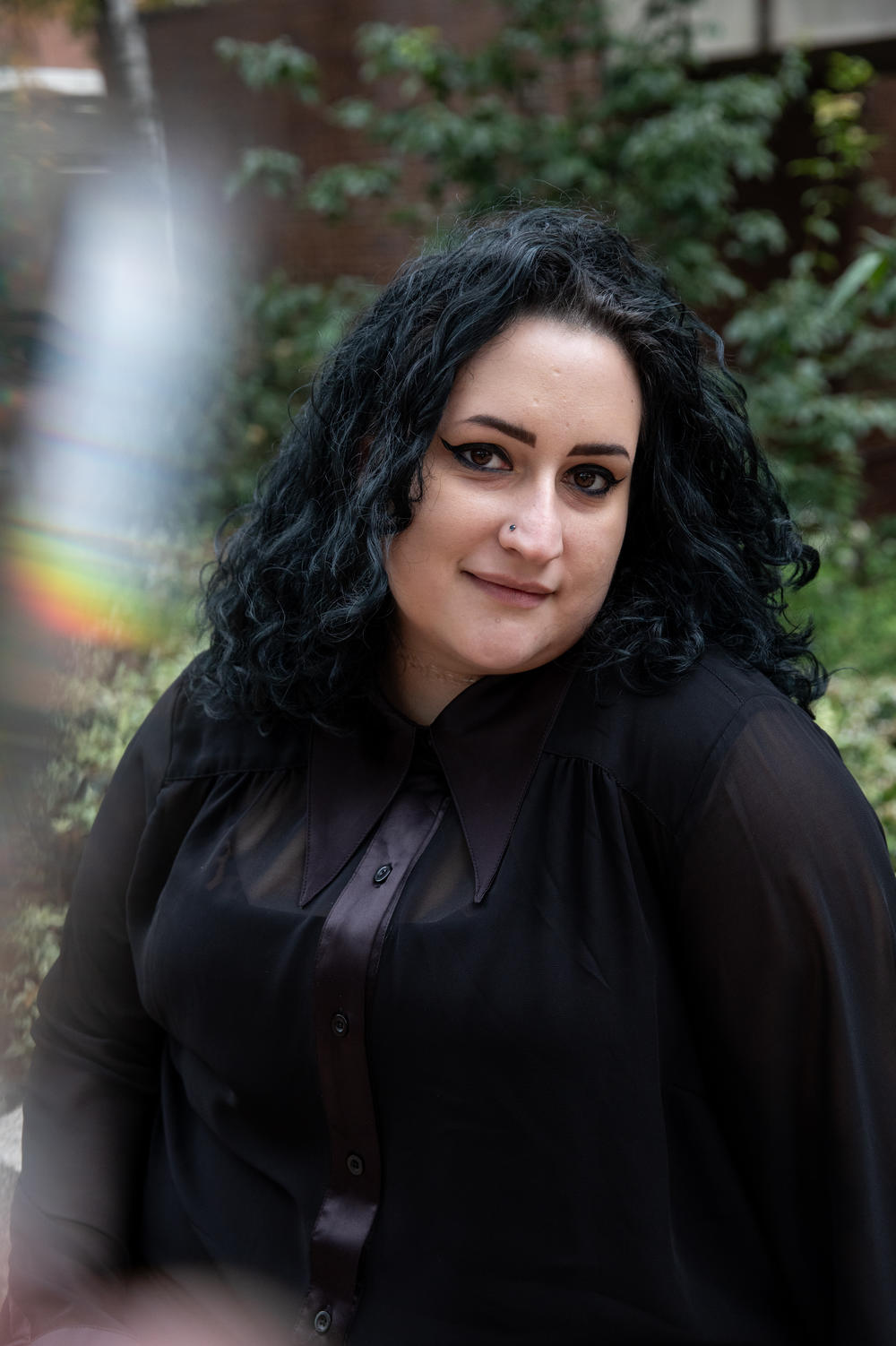 Cáer Smith brought clothing she doesn't wear in the hopes others would repurpose them at the Plus Size Swap + Shop at Philly Fat Con. She also picked up a swim dress, a brown silky button down and a black velvet dress from the swap.
