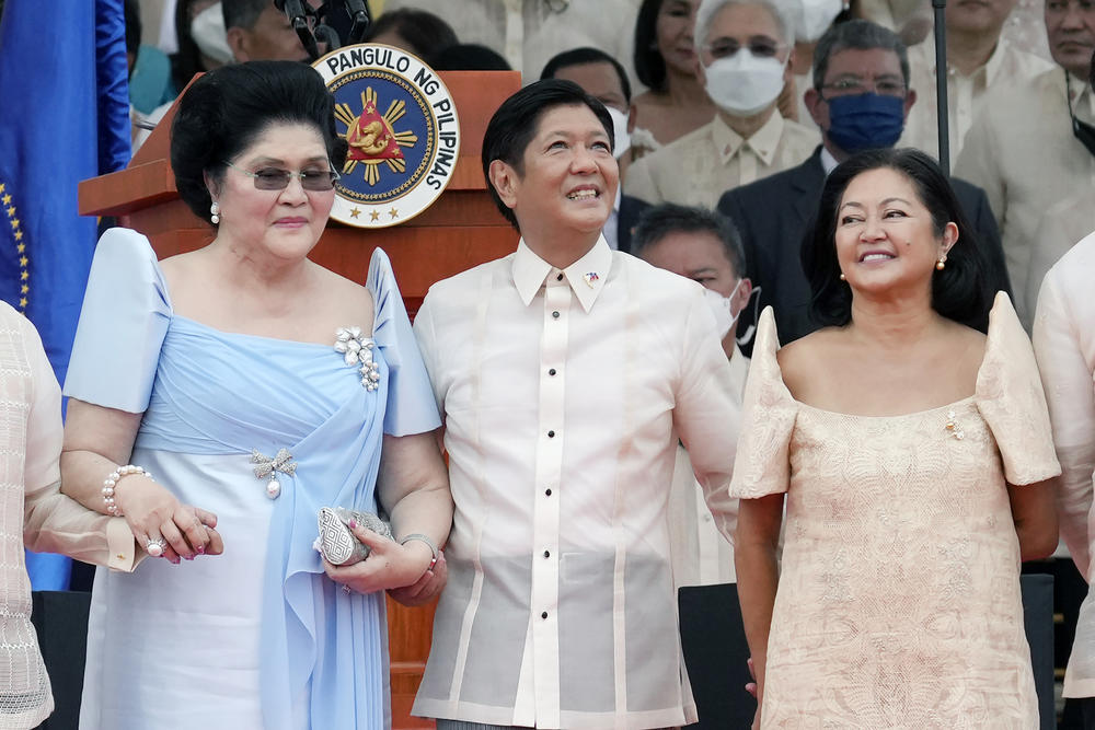Philippine President Ferdinand Marcos Jr. stands with his mother Imelda (left) and his wife Louise Araneta-Marcos during the inauguration ceremony at the National Museum on June 30, 2022, in Manila, Philippines.
