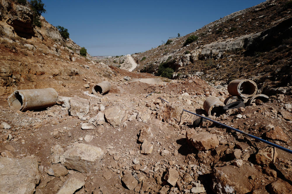 The road towards Ayoub Abuhejleh's land and olive trees is undriveable.
