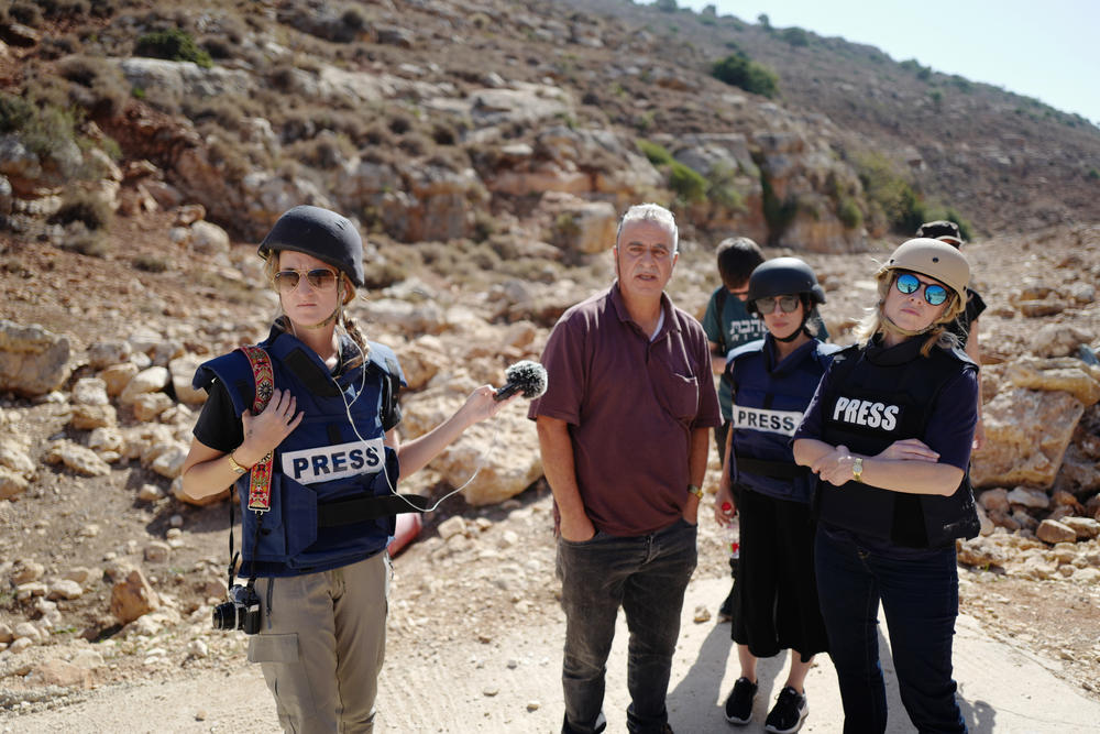 Abuhejleh and the NPR team watch Israeli forces about to confront them.