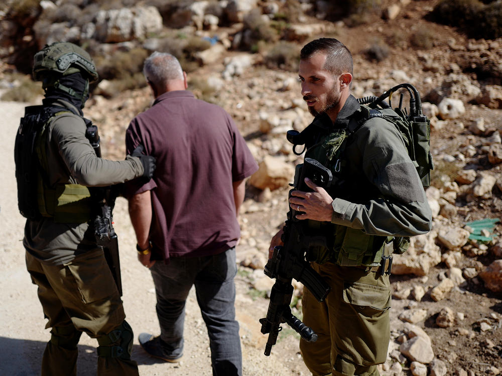 Israeli forces take Ayoub Abuhejleh while he was being interviewed by NPR in the West Bank.