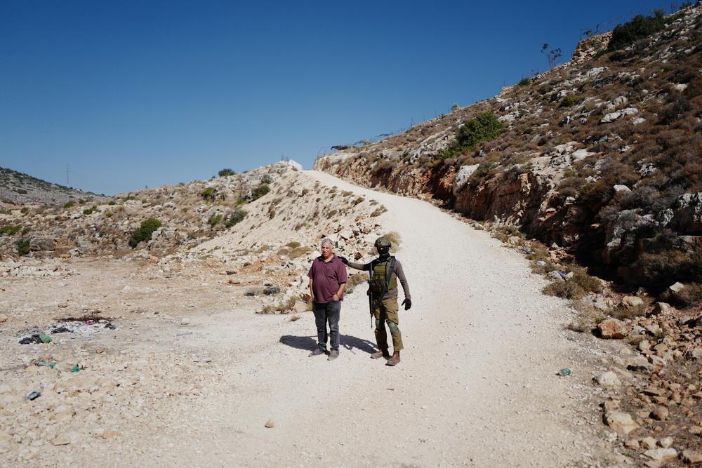 Israeli forces detaining Abuhejleh.