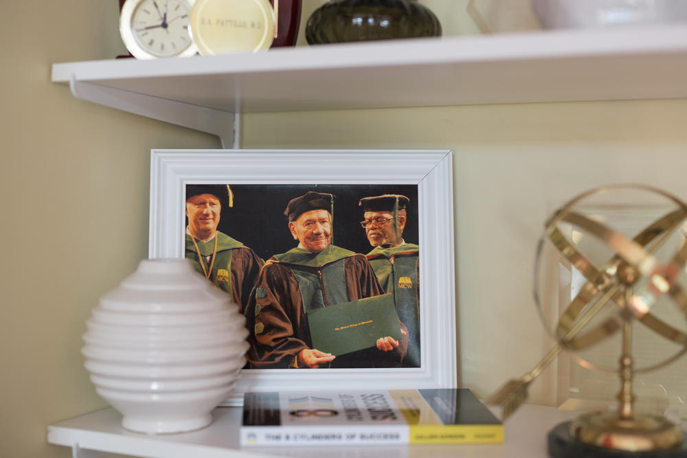 A photo of Dr. Roland Pattillo sits in the living room of Pat Pattillo.