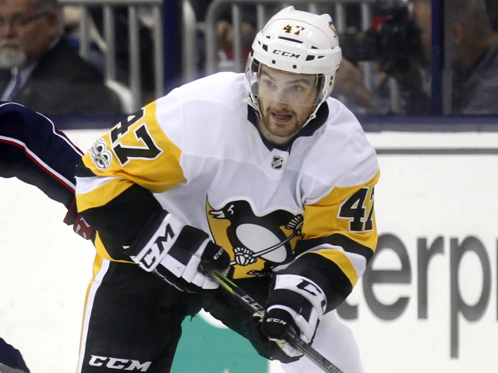 Former Pittsburgh Penguins forward Adam Johnson in action during an NHL game in Columbus, Ohio, in 2017. Police in England arrested a man Tuesday on suspicion of manslaughter in connection to Johnson's death in October.