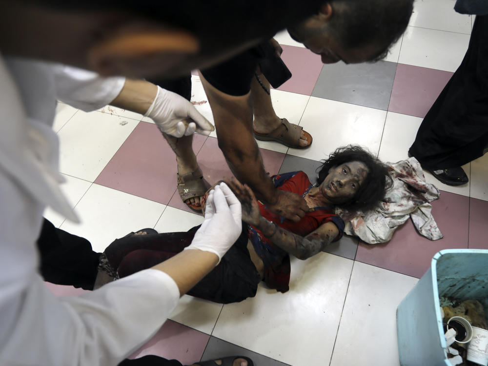An injured Palestinian girl receives treatment at al-Shifa hospital, following Israeli airstrikes on Gaza City, central Gaza Strip, on Nov. 5.