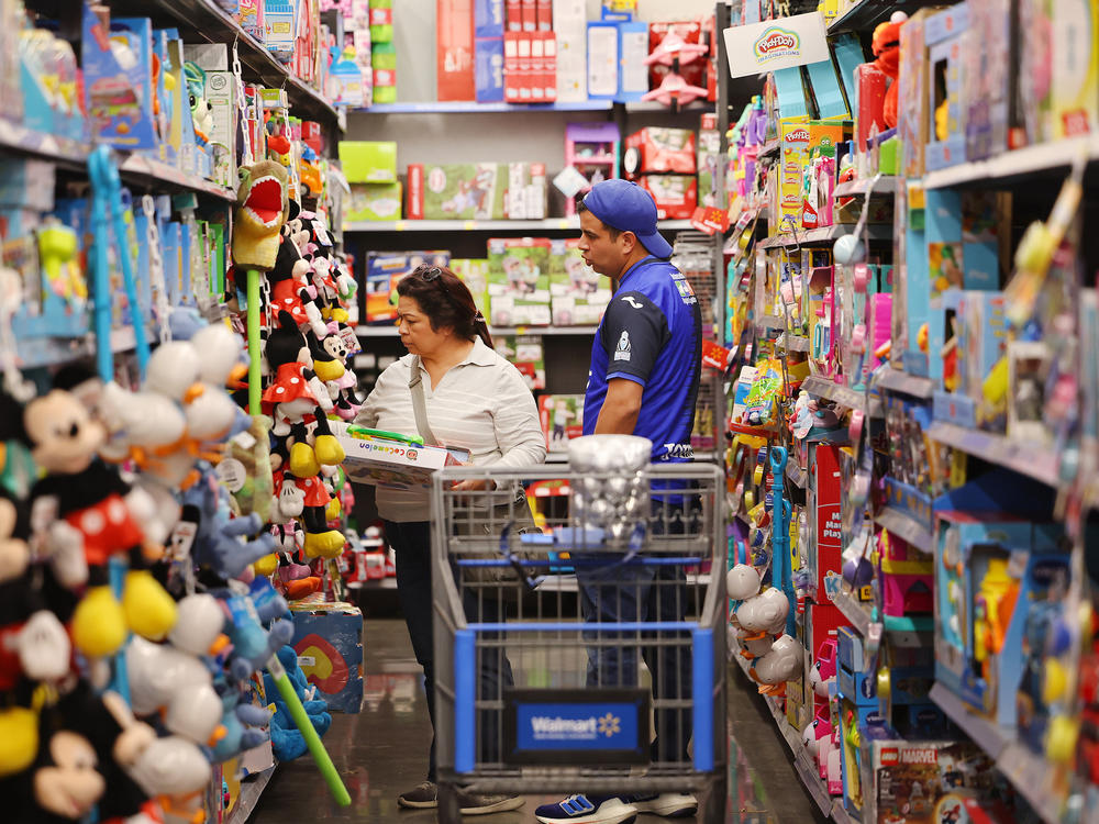 People shop ahead of Black Friday at a Walmart Supercenter on Tuesday in Burbank, Calif.