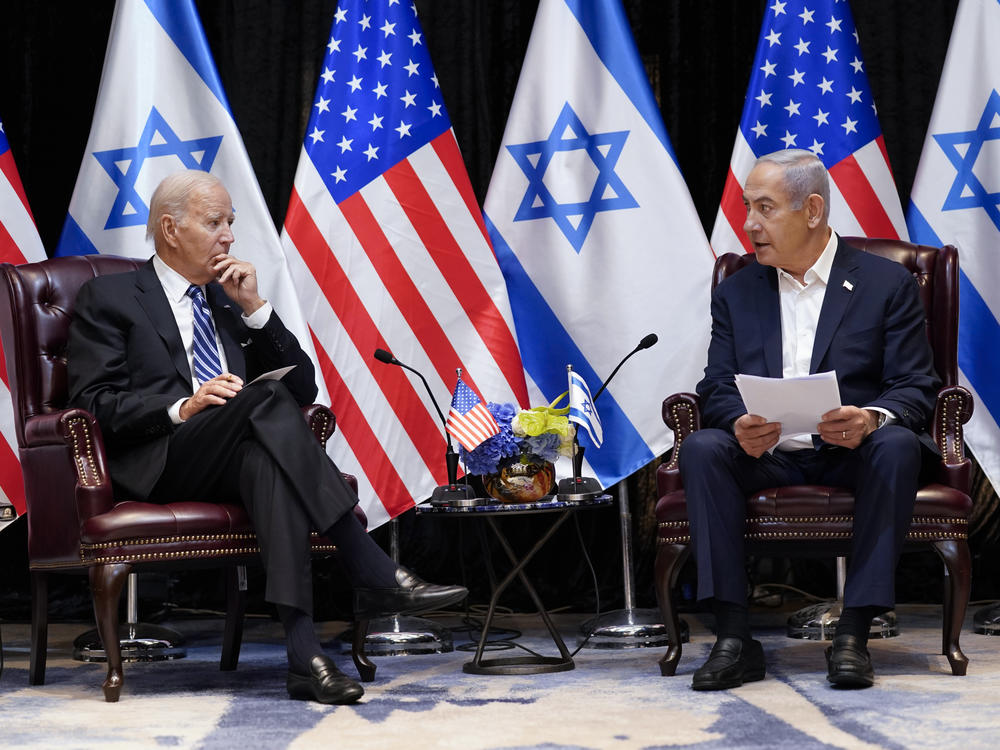 President Joe Biden and Israeli Prime Minister Benjamin Netanyahu participate in an expanded bilateral meeting with Israeli and U.S. government officials, Oct. 18, 2023, in Tel Aviv.