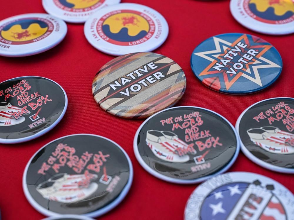 Pins are pictured at a display counter during a cultural meeting at the Comanche Nation fairgrounds in Lawton, Okla., on Sept. 30.