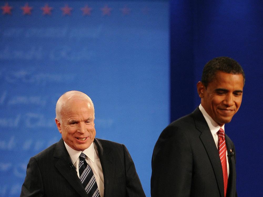 Republican John McCain (L) and Democrat Barack Obama (R) stand on stage together following their third and final presidential debate on Oct. 15, 2008 in New York.