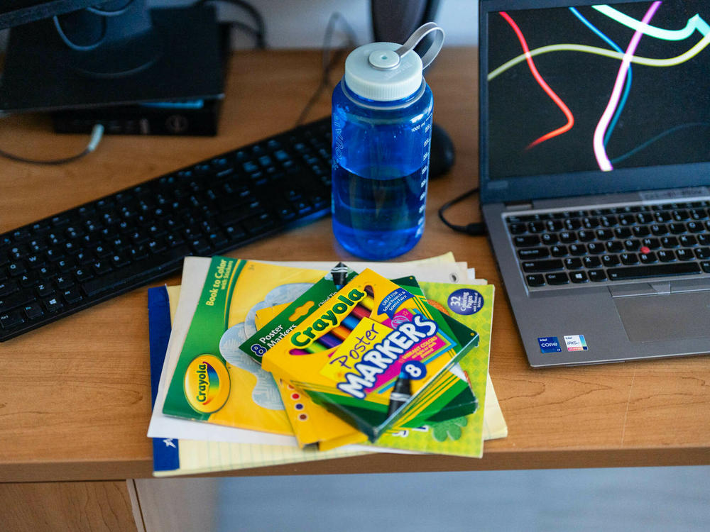 Ashley Close keeps a coloring book and markers on her desk to entertain young patients while she meets with their parents and doctors. Close works out of an office at Children's National's Anacostia clinic in Washington, D.C., so she can work closely with doctors on patients' cases.