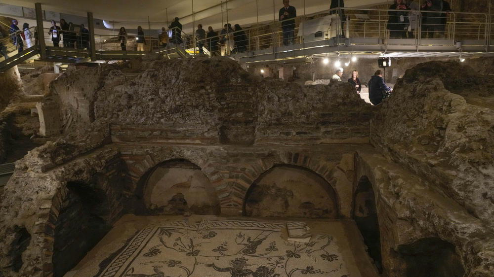 Visitors explore the Roman Necropolis at The Vatican.