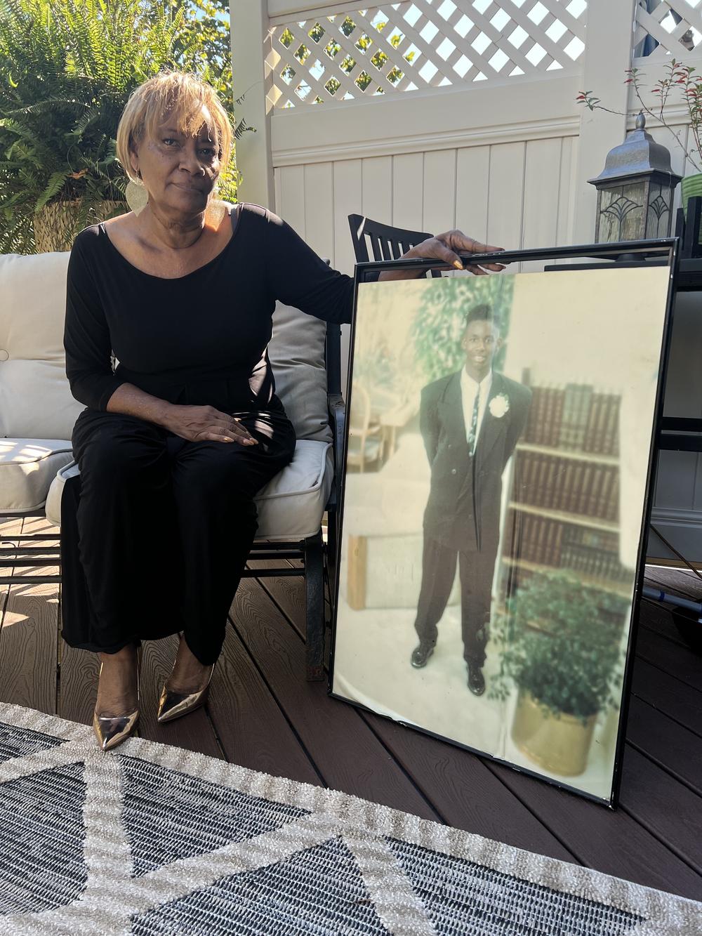 Fowler with a photograph of her son, in October 2023.
