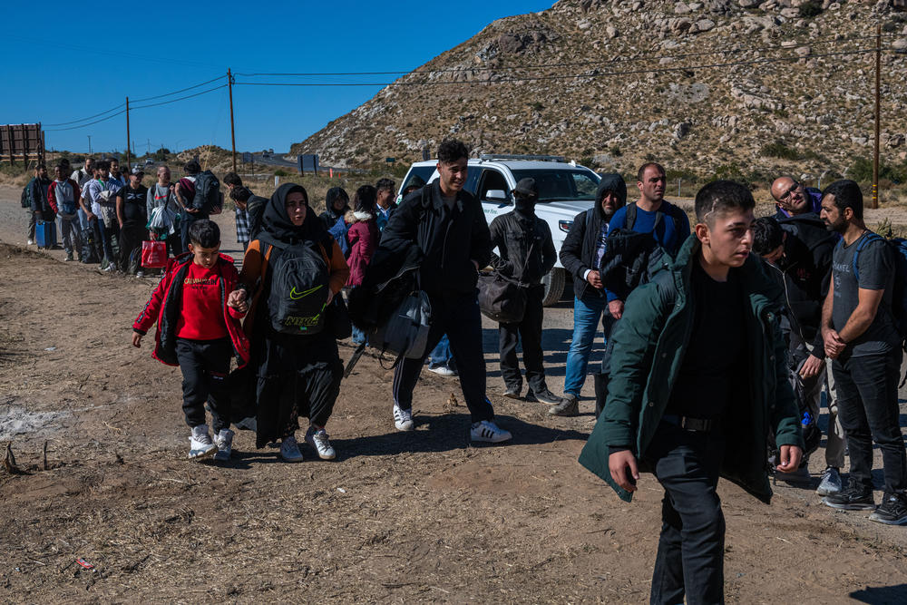U.S. Border Patrol agents usher hundreds of immigrants into a series of camps in Jacumba, which is near the U.S.-Mexico border.