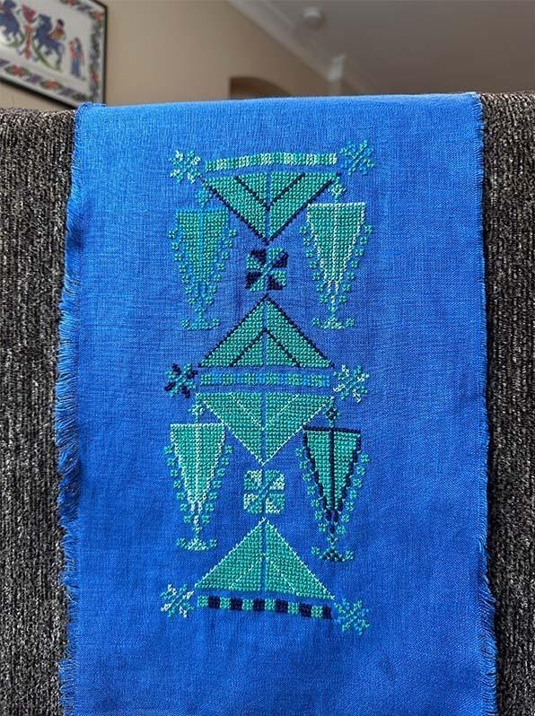 This design is my take on Beit Dajan Amulets. It's taken from the dress of a married Palestinian woman from the village of Beit Dajan near Jaffa in the 1900s. Amulets or <em>hujub </em>were traditionally used to protect from evil and bring good luck.