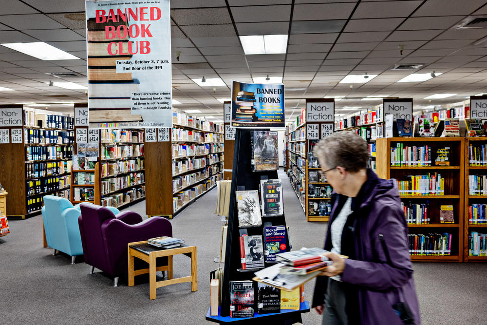 Halli Stone of Parents Against Bad Books looks at a Banned Book Week display at the public library in Idaho Falls, Idaho. She is among those advocating for more parental involvement in the selection of library books for young readers.