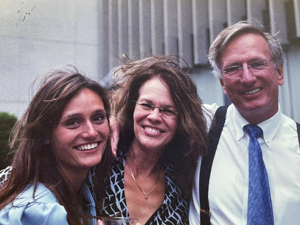 This is me with my parents at my grad school graduation in the Spring of 2004.