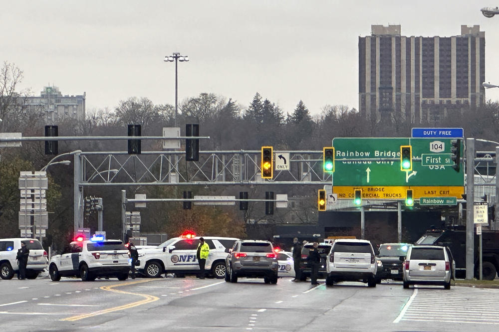 Law enforcement personnel block off the entrance to the Rainbow Bridge border crossing on Wednesday in Niagara Falls, N.Y., after a vehicle exploded at a checkpoint.