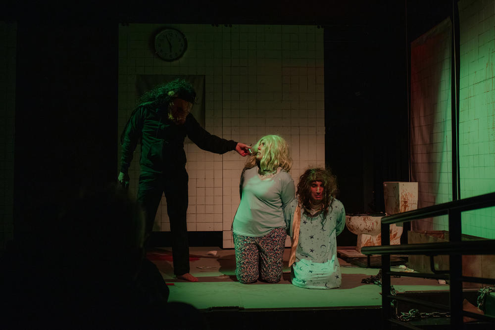 Jill Owen (left) and Adam Parbhoo (right) on stage.