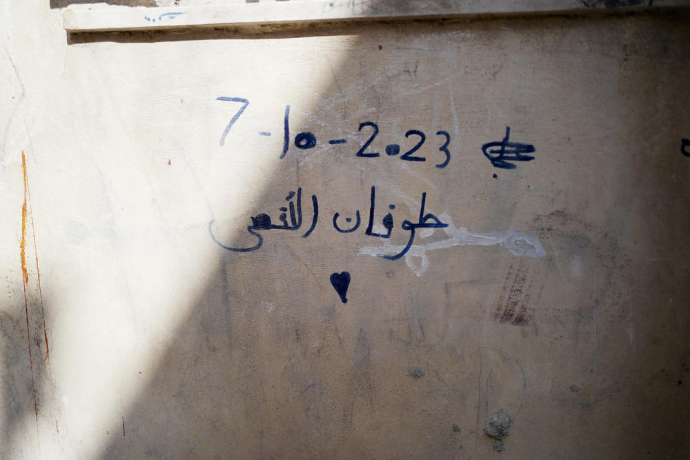 Graffiti in the camp marking the Hamas Oct. 7 attack on Israel.