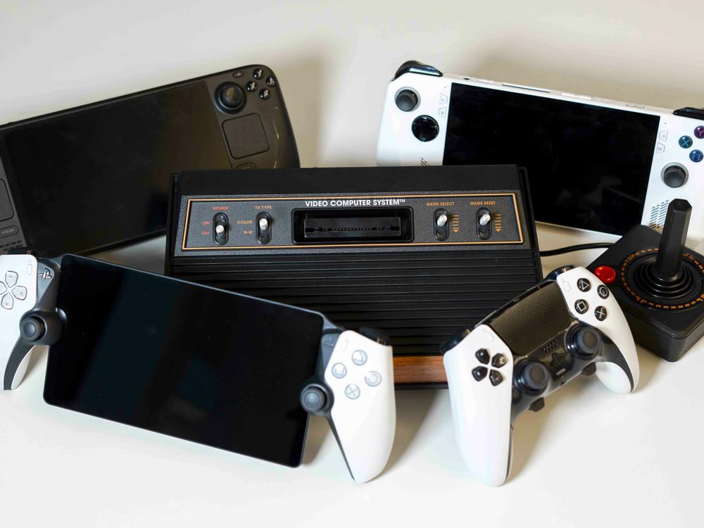 From left to right, top to bottom: the Steam Deck OLED, ASUS Rog Ally, Atari 2600+, PlayStation Portal, and DualSense Edge Controller.