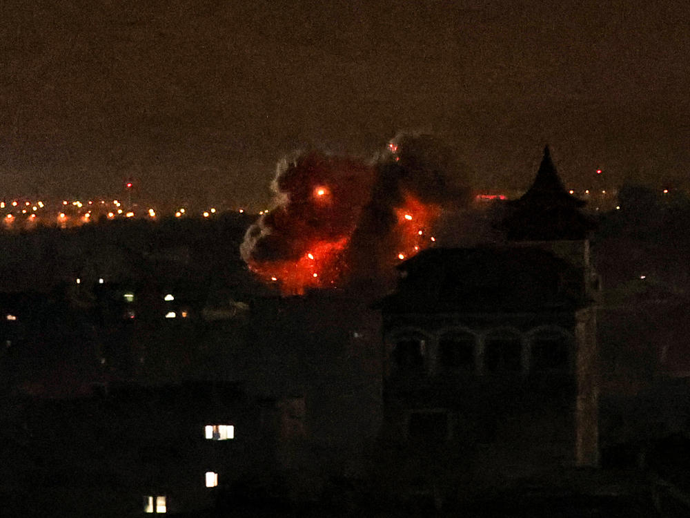 Smoke and fire rise above buildings during Israeli strikes on Rafah in the southern Gaza Strip on Nov. 23, 2023, amid ongoing battles between Israel and the Palestinian Hamas movement.