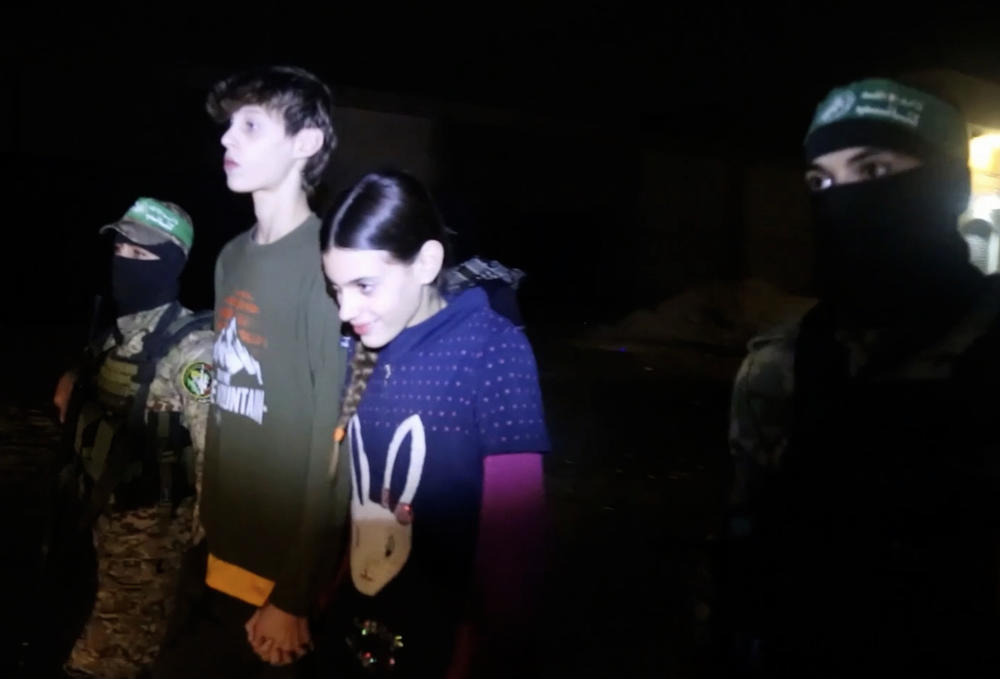 A screen grab captured from a video shows the release of Israeli hostages as part of the exchange agreement during the four-day humanitarian pause in Gaza City, Gaza on Nov. 26, 2023.
