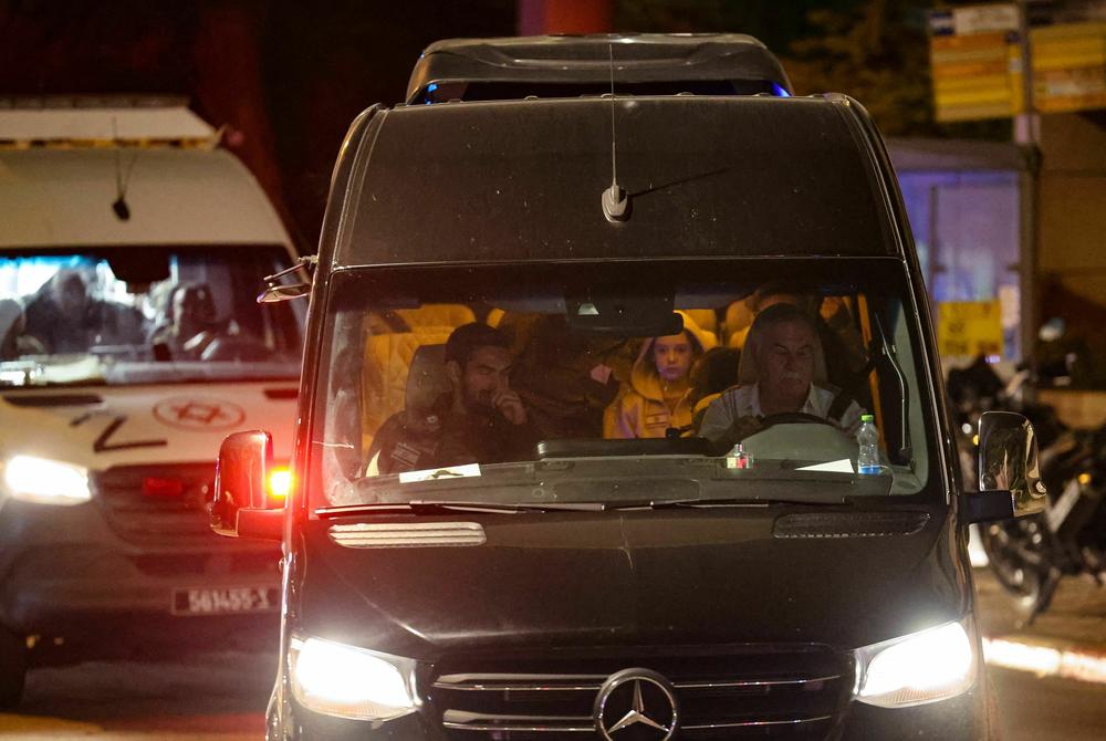 A convoy carrying Israeli hostages released by Hamas from the Gaza Strip arrives at the Sheba Medical Center in Ramat Gan, on Nov. 26, 2023.