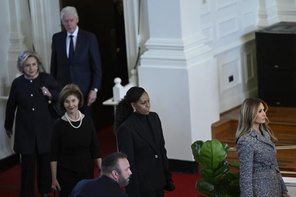 (L-R) Former US Secretary of State Hillary Clinton, former US First Lady Laura Bush, former US First Lady Michelle Obama, and former US First Lady Melania Trump arrive for a tribute service for former US First Lady Rosalynn Carter, at Glenn Memorial Church in Atlanta, Ga., on Nov. 28, 2023.