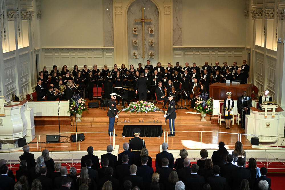 The casket of former US First Lady Rosalynn Carter is carried in for a tribute service, at Glenn Memorial Church in Atlanta, Ga., on Nov, 28, 2023.