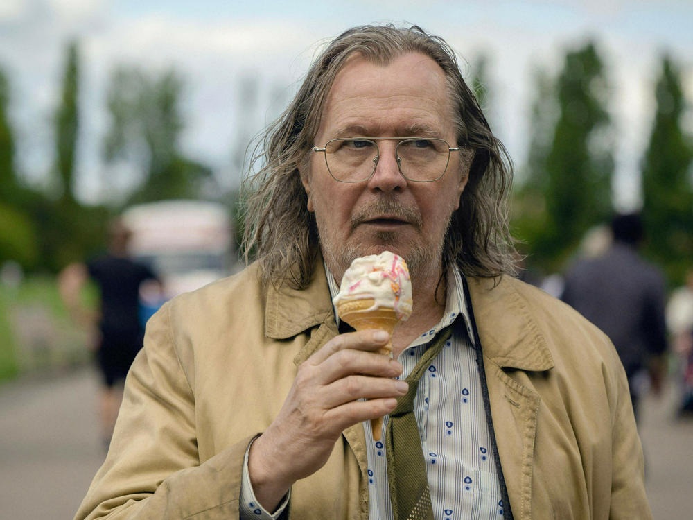In Apple TV+'s <em>Slow Horses</em>, Gary Oldman plays Jackson Lamb, the slovenly, brilliant spy who's in charge of a group of failed British spies. The series is based on Mick Herron's <em>Slough House</em> novels. Herron says Lamb might not have 