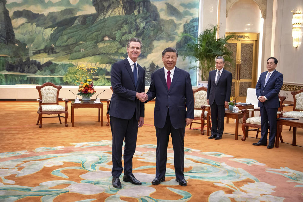 In this photo released by Office of the Governor of California, California Gov. Gavin Newsom, left, meets with Chinese President Xi Jinping at the Great Hall of the People in Beijing, last month.