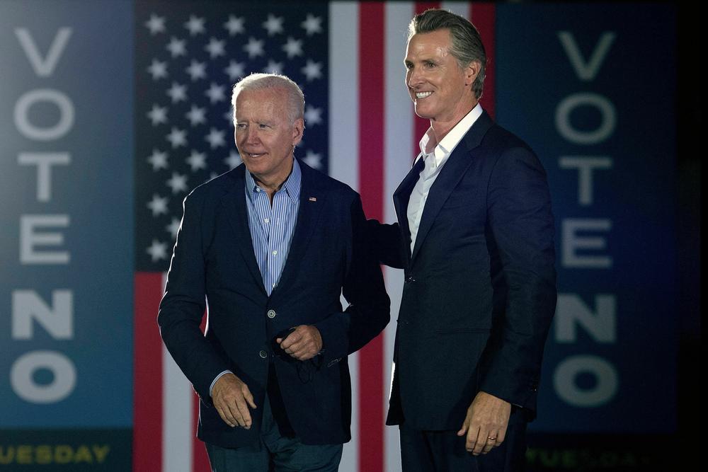 California Gov. Gavin Newsom greets President Biden during a campaign event at Long Beach City College in Long Beach, Calif., on Sept. 13, 2021.