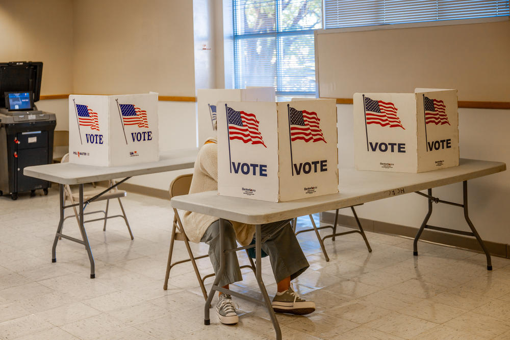 A voter fills out their ballot at a U.S. Air Force building in Jackson, Miss., on Nov. 7.