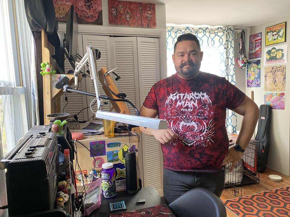 Baltimore illustrator John de Campos isn't happy that AI is being used to create images for commercial purposes, supplanting artists whose real life experience is reflected in their work.