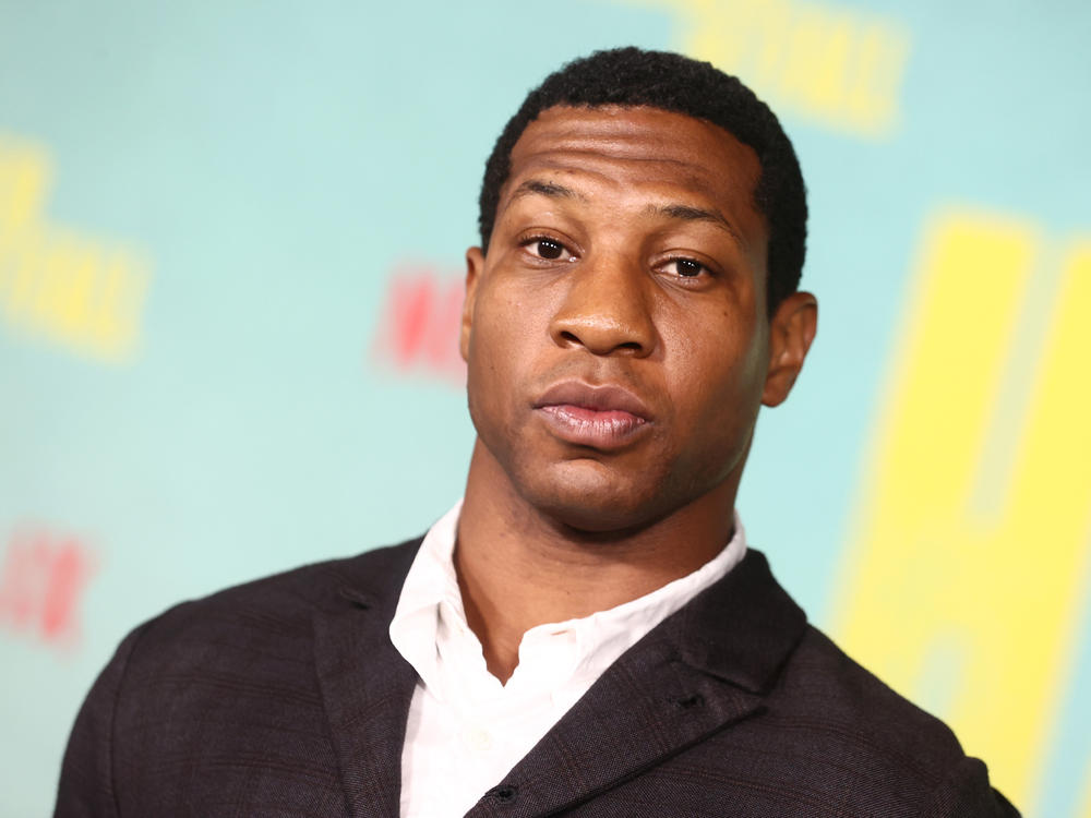 Jonathan Majors faces misdemeanor charges of harassment and assaulting a former girlfriend. He's shown above in Los Angeles in October 2021.