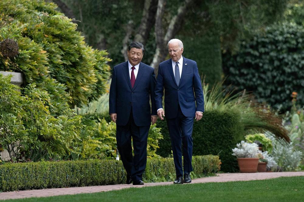 Biden and Xi walk together after a meeting during the APEC Leaders' week in November.