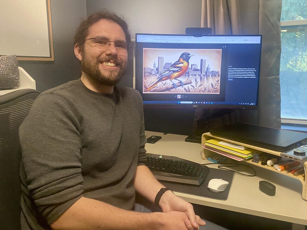 Jeffrey Garcia with an image of a Baltimore oriole he created using DALL-E 3 in October 2023.