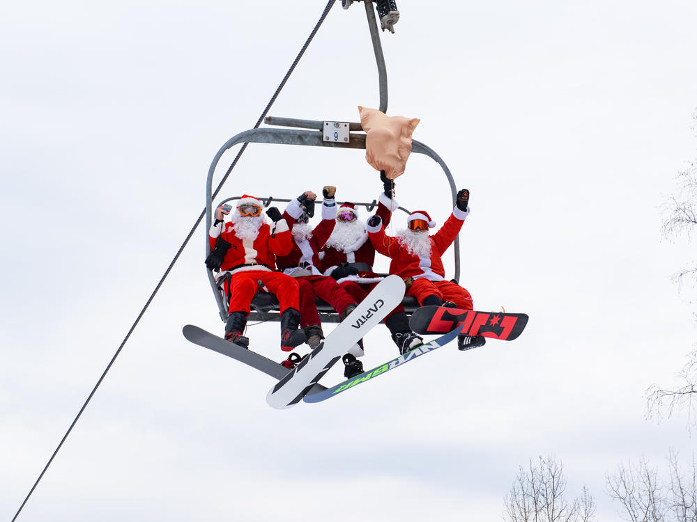 The Sunday River chairlift is overtaken by Santas for a few minutes every December.