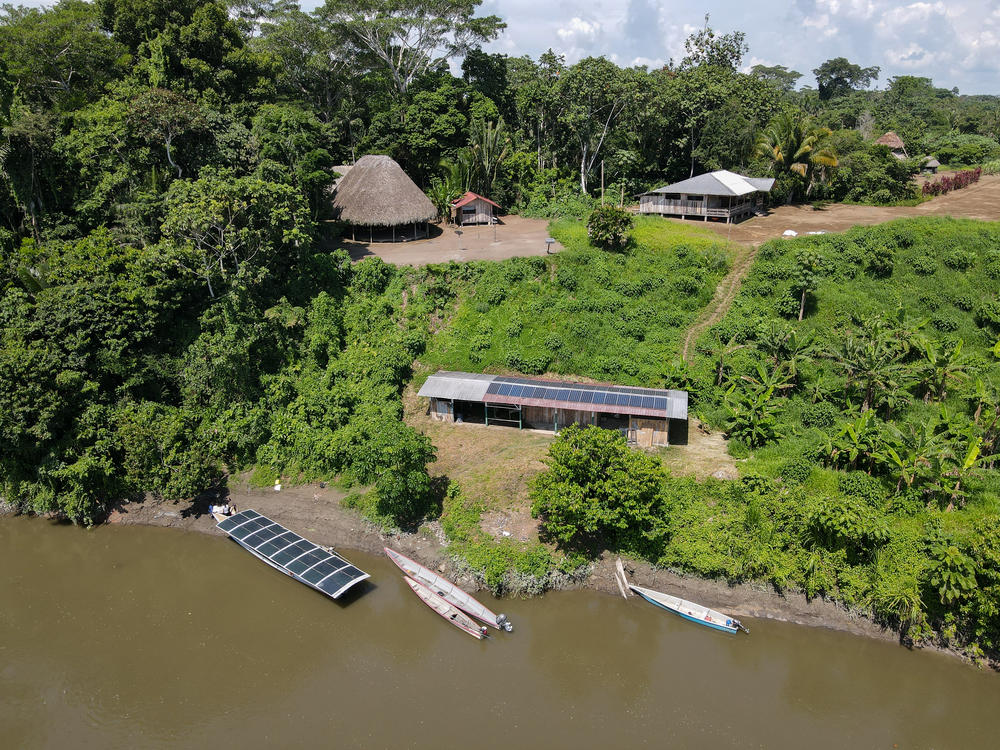 The solar boat and solar charging center at the Achuar village of Sharamentsa in Ecuador.