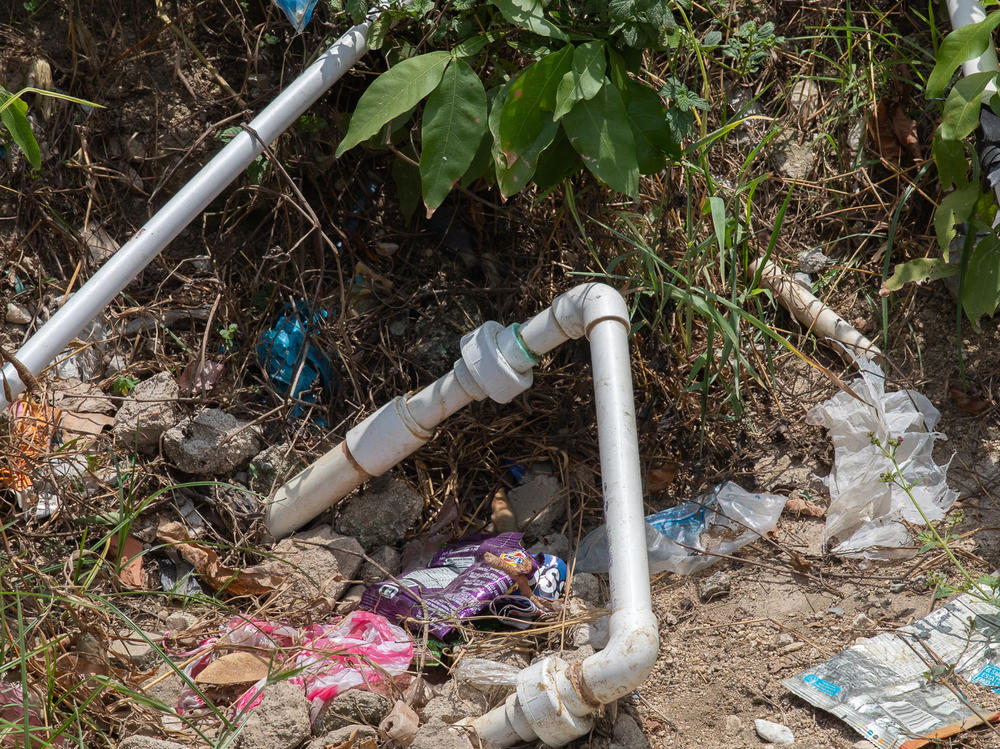 Residents have installed 1-inch plastic pipes to tap into the main water pipeline that runs under the streets of La Paz.