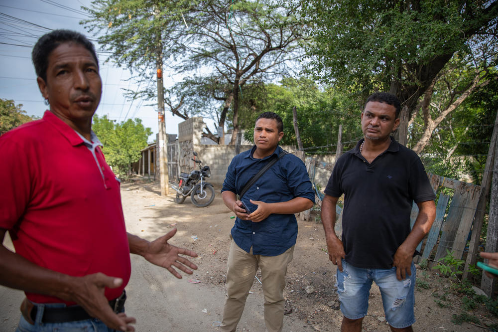 Community leaders Nelinton Guerrero (left), Carlos Ramos (center) and Aníbal Ruda work with the water utility to improve water distribution for La Paz's 15,000 residents.