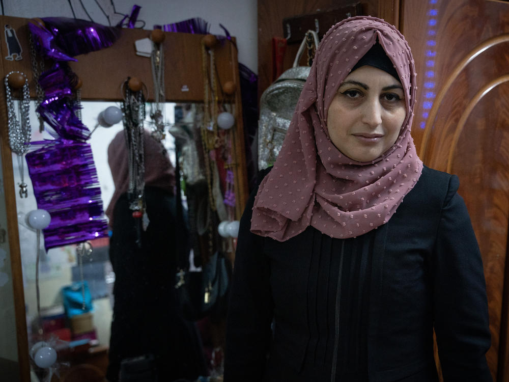 Rimah Shahada poses in her daughter Aseel's bedroom in Qalandiya refugee camp in Ramallah, West Bank Nov. 22.