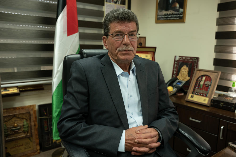 A Palestinian official overseeing prisoner affairs, Qadoura Fares, sits in his office in Ramallah, West Bank, on Nov. 22. Fares was also released as part of a prisoner exchange deal in 1994 after being held in prison for 13 years.