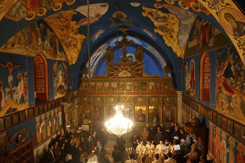 Worshippers attend a mass in the Church of Saint Porphyrius on Jan. 7, 2013 in Gaza City.
