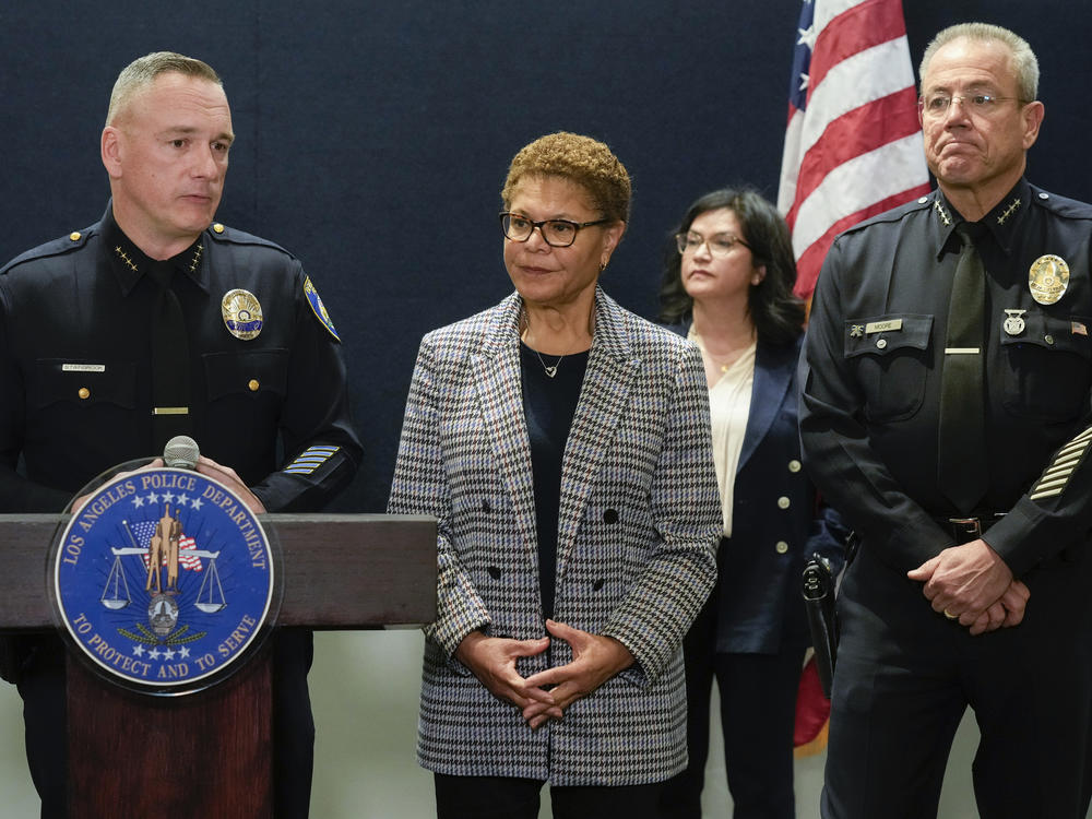 Beverly Hills Police Chief Mark Stainbrook, left, Mayor Karen Bass and Los Angeles Police Chief Michel Moore announce the arrest of a suspect in three recent killings of homeless men, Saturday, Dec. 2, 2023, in Los Angeles.