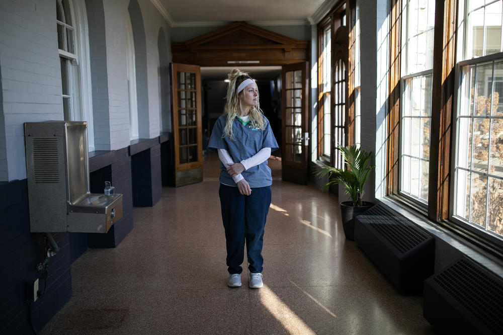 Samantha Davis stands in a hallway in the Ohio Reformatory for Women, where she is currently incarcerated for aggravated vehicular homicide.