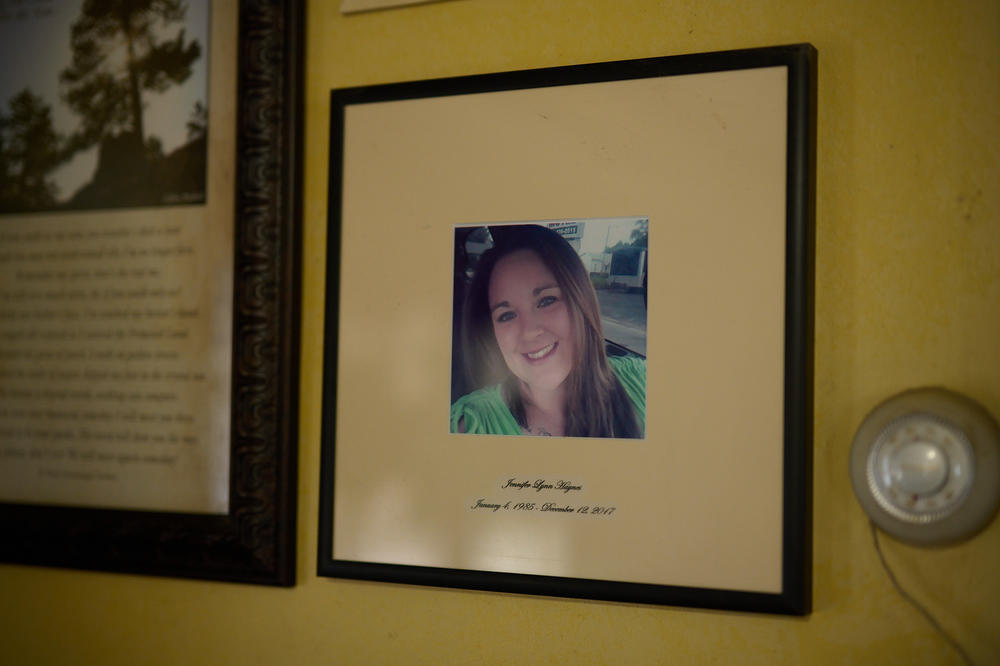 A framed photo of Ernie and Marcella Haynes' daughter, Jennifer, hangs as a memorial in their home.