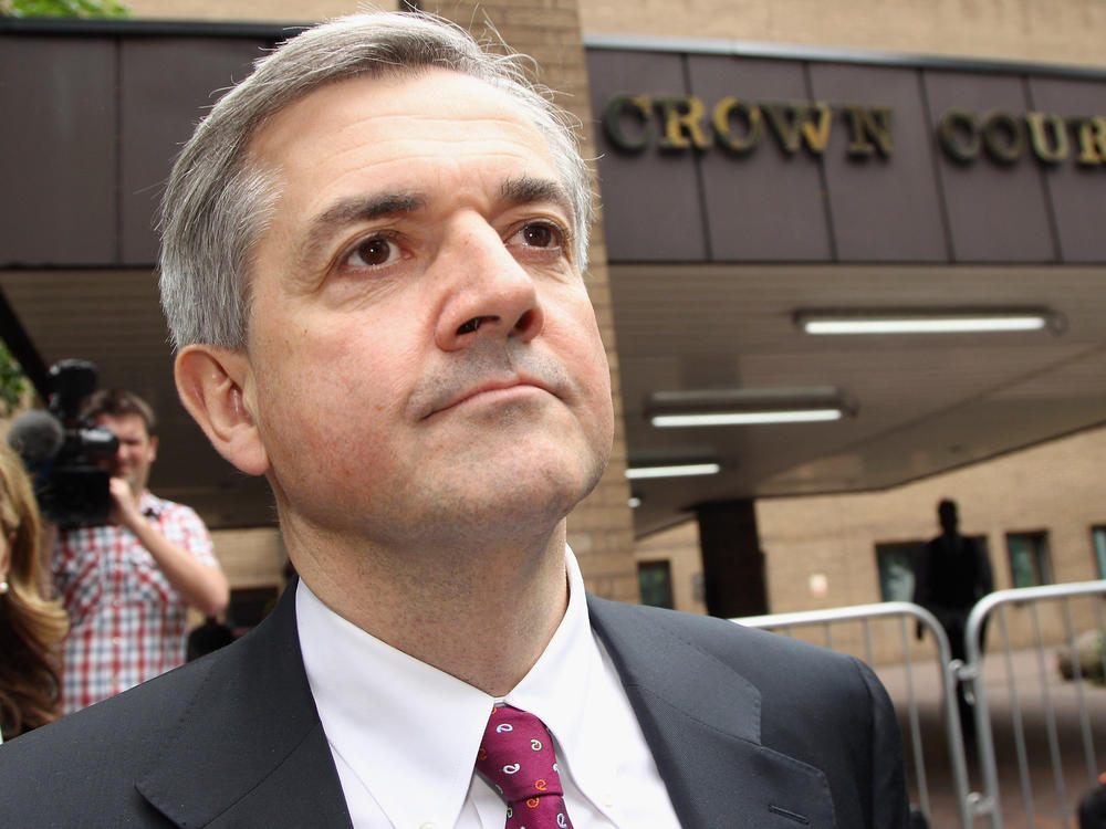 Former Cabinet Minister Chris Huhne is among three former U.K. officials who allege the Murdochs' tabloids hacked into their voice mails to further a corporate agenda. In Huhne's case, revelations in Murdoch's papers led to scandal and a jail term.