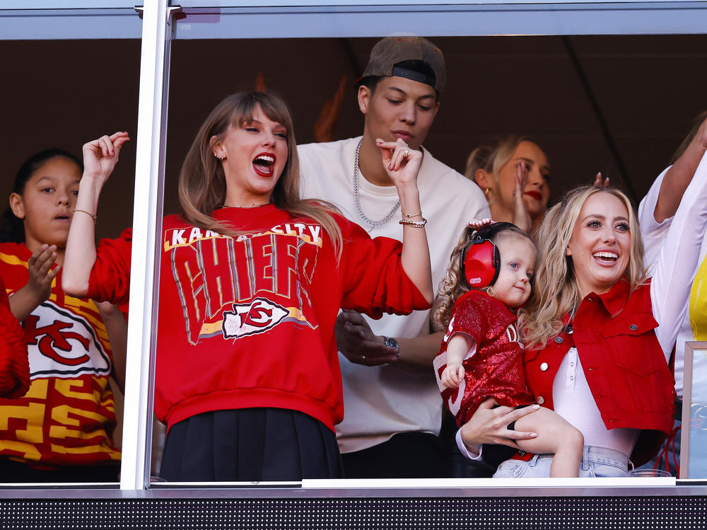 Taylor Swift celebrates a touchdown during the Kansas City Chiefs and Los Angeles Chargers game at Arrowhead Stadium on Oct. 22 in Kansas City, Mo.