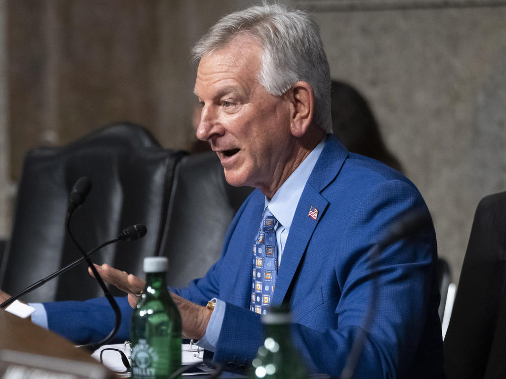 Sen. Tommy Tuberville, R-Ala., says he is dropping his monthslong hold on most military promotions. He will continue to block promotions for four-star generals over his objections to a Pentagon abortion policy.